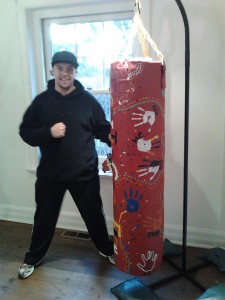 'Fight The Good Fight' Punching Bag painted by the Koorie Youth Group with message - "fight the good fight"