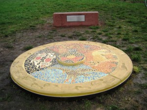 Completed Medicine Wheel sculpture and Seat with Plaque