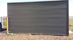 BEFORE - the shed wall to house the Mural overlooking the Growling Grass Frog Natural Outdoor Play Space Pakenham